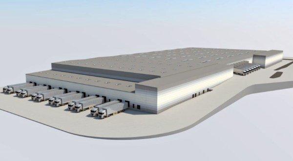 Com40 buduje magazyn z showroomem